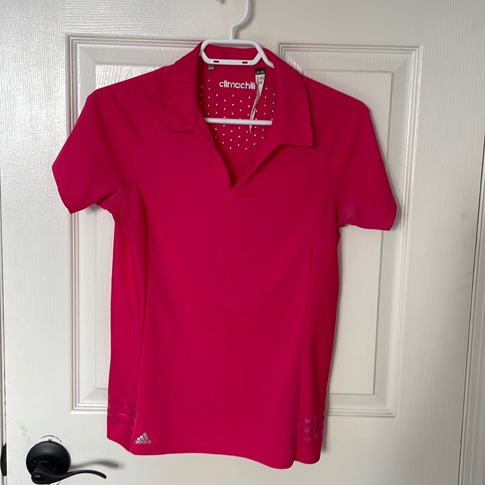Hot pink adidas golf tee